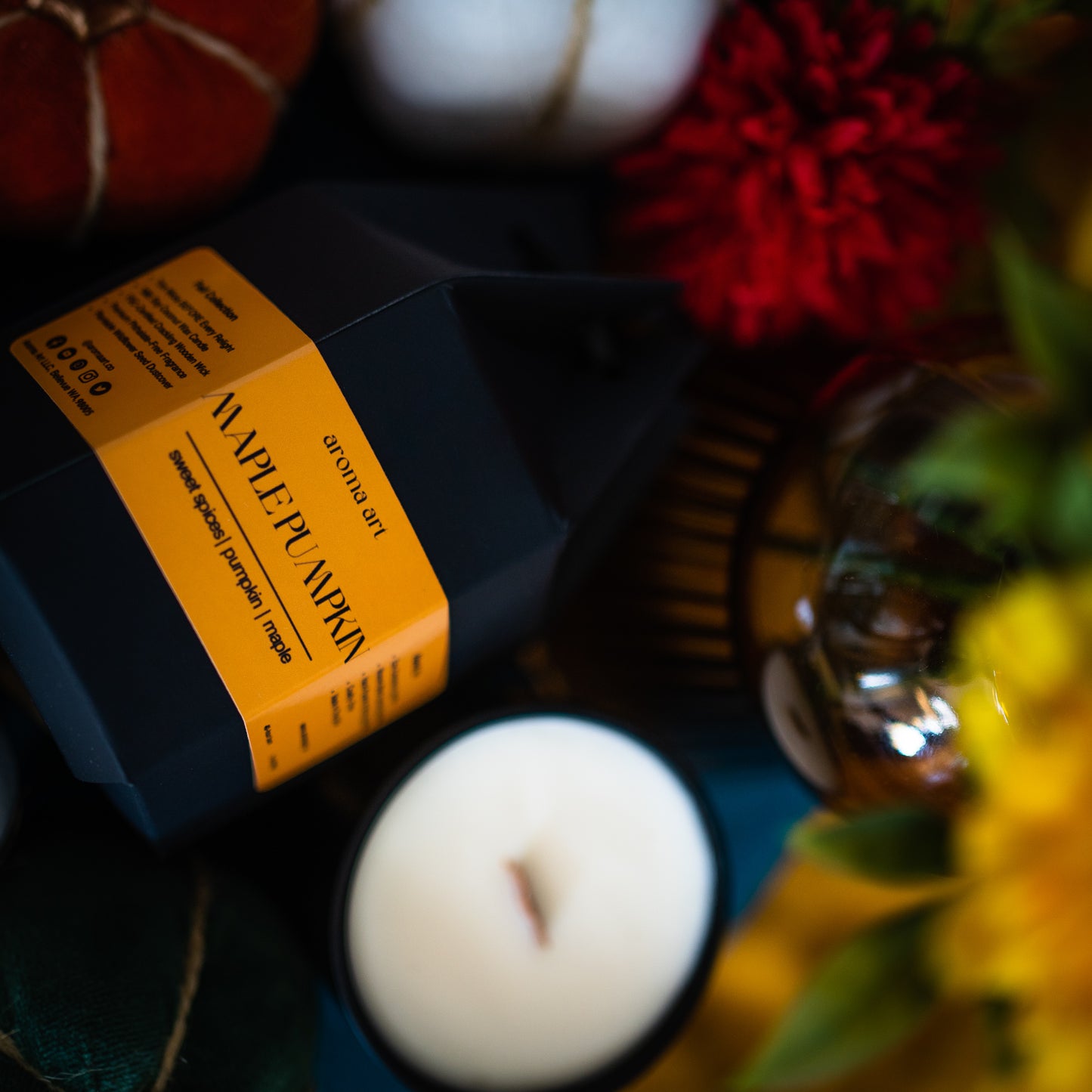 7oz wooden wick soy coconut wax candle named Maple Pumpkin, with notes of sweet spices, pumpkin, maple, and pumpkin spice. A warm and inviting scent perfect for the fall season.