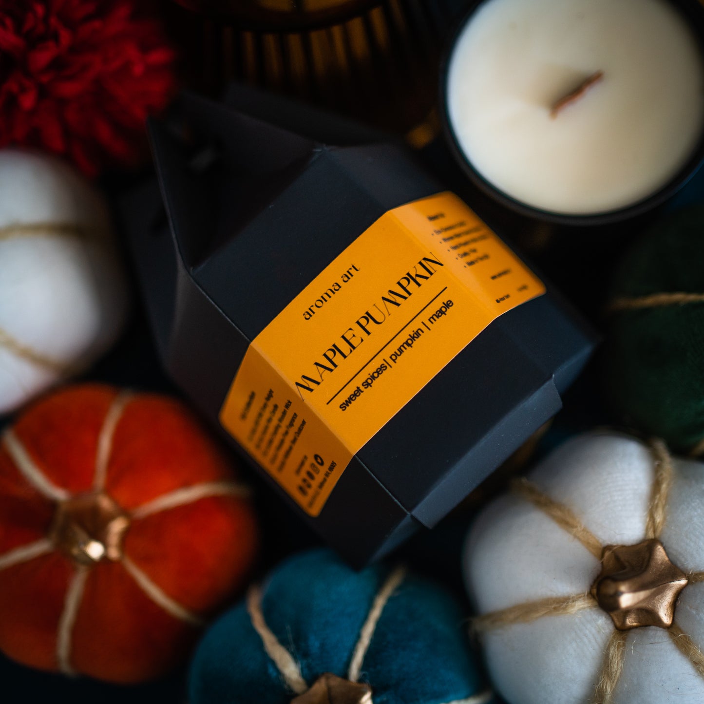 7oz crackling wooden wick soy coconut wax candle named Maple Pumpkin, with notes of sweet spices, pumpkin, maple, and pumpkin spice. A warm and inviting scent perfect for the fall season.