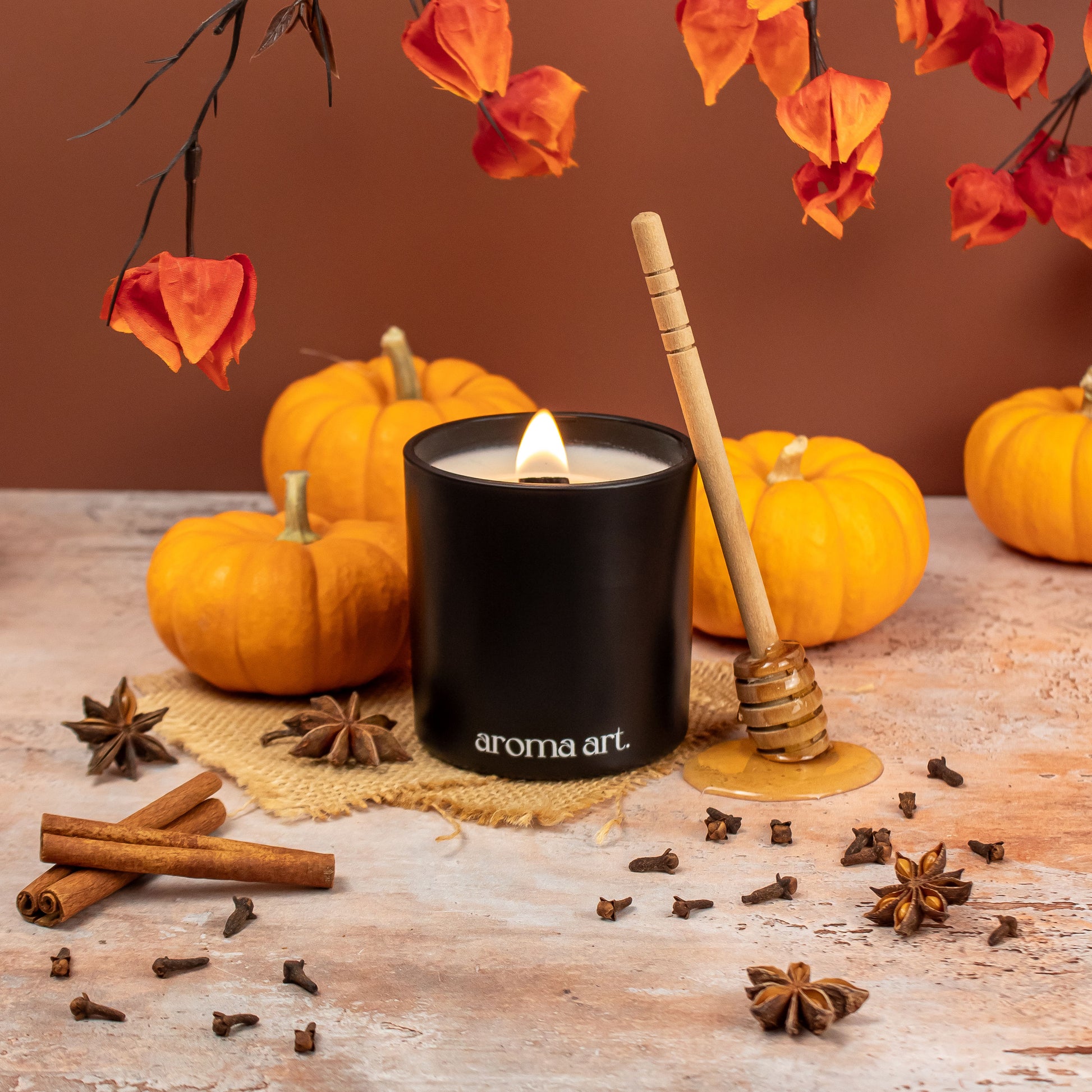 A 7oz crackling wooden wick candle in the scent Maple Pumpkin. Featuring notes of sweet spices, pumpkin, and maple. This cozy candle encapsulates the essence of the season and is the perfect addition to your fall decor.