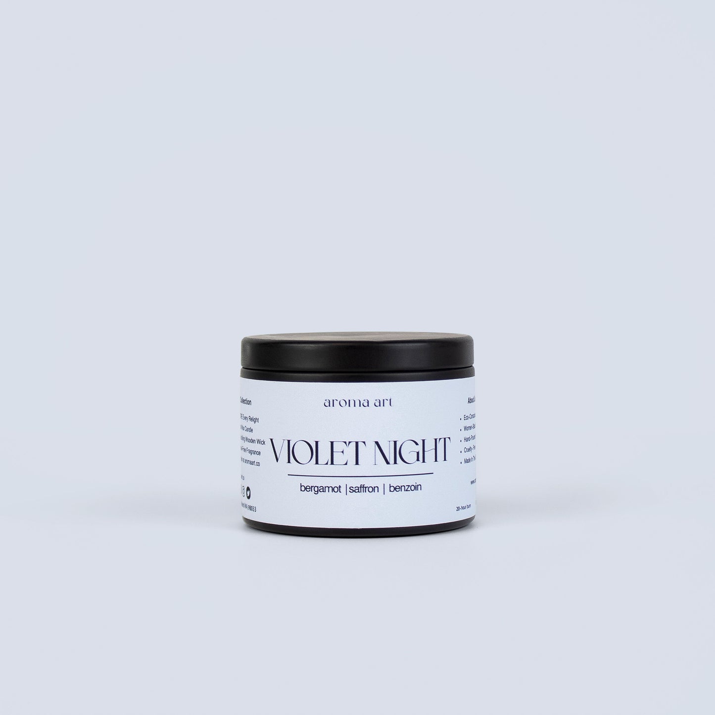 A 3.5oz travel sized tin crackling wooden wick candle named Violet Night with notes of bergamot, saffron, and benzoin. A sensual scent evoking the inspirational vibes of an evening at the jazz lounge. Perfect for a night of self-care or a romantic evening