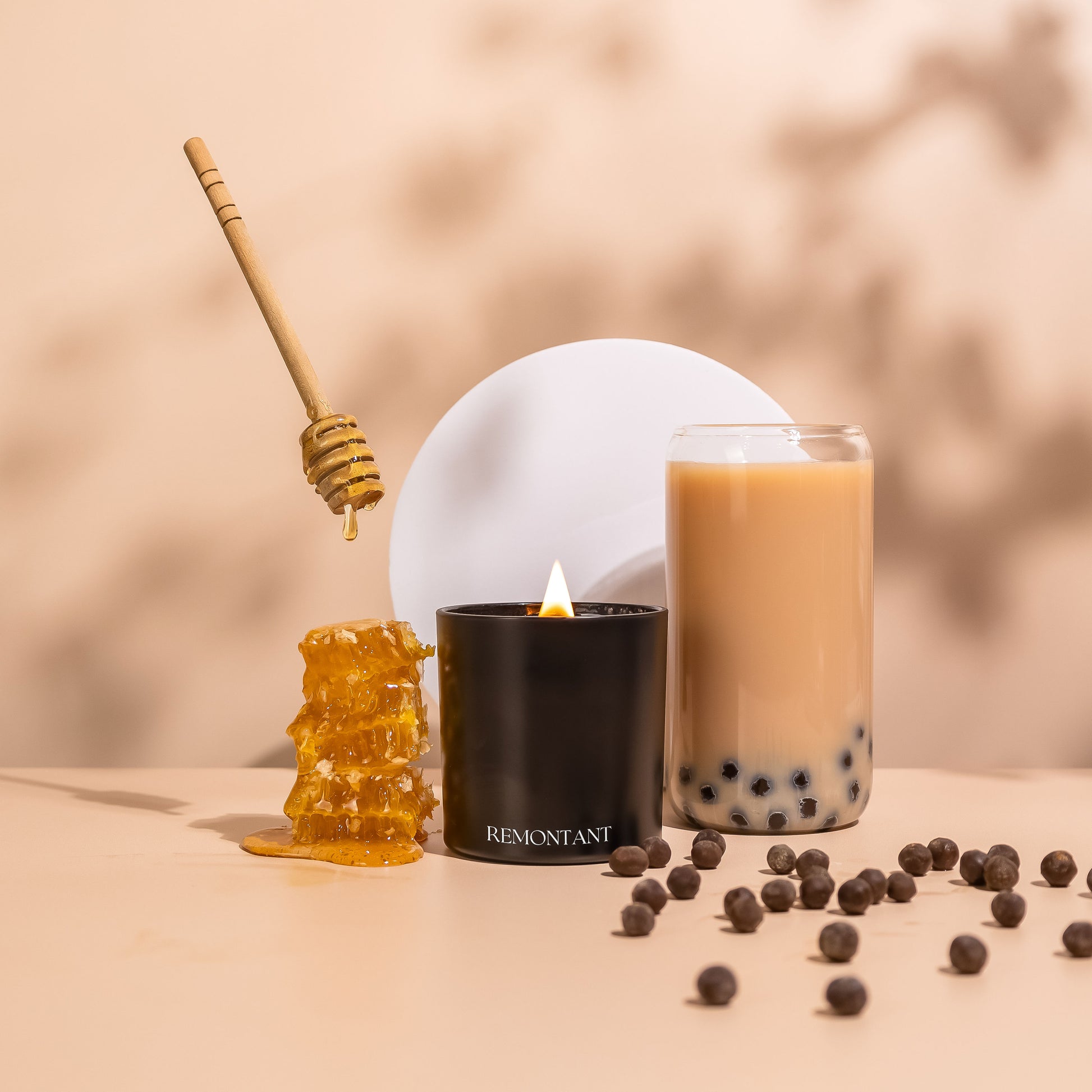 Eco-conscious , hand poured , 7oz Honey Boba Candle. Experience the soothing aroma of brown sugar, figs, and honey butter."